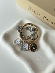 Saat charmlı bileklik