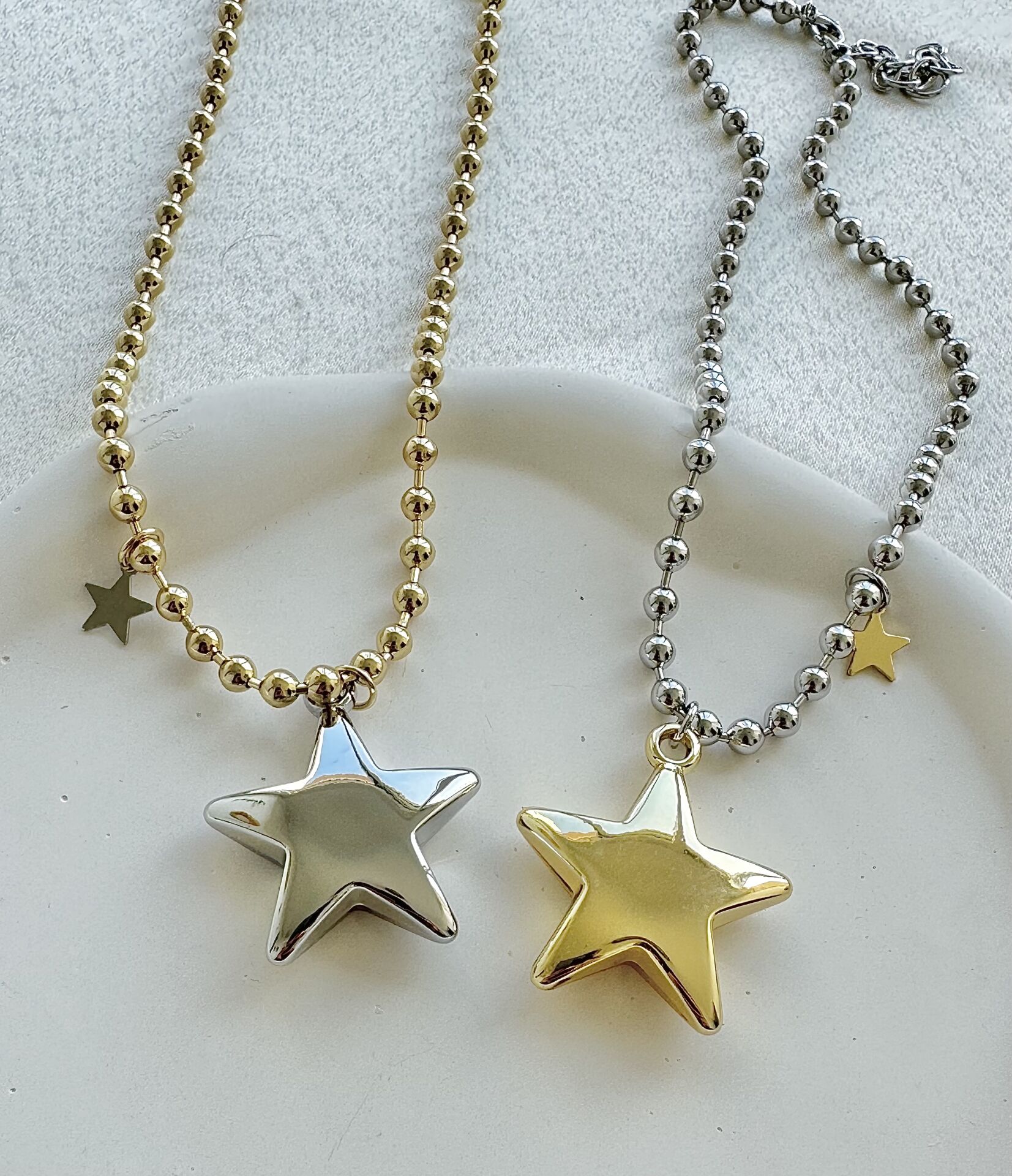 Çelik topcuk detaylı yıldız kolye Gold renk